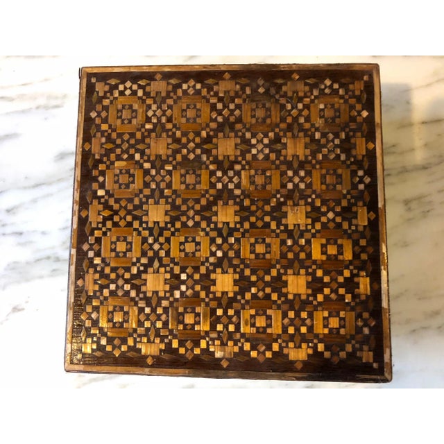 A small part damaged, please see picture but in good general condition.