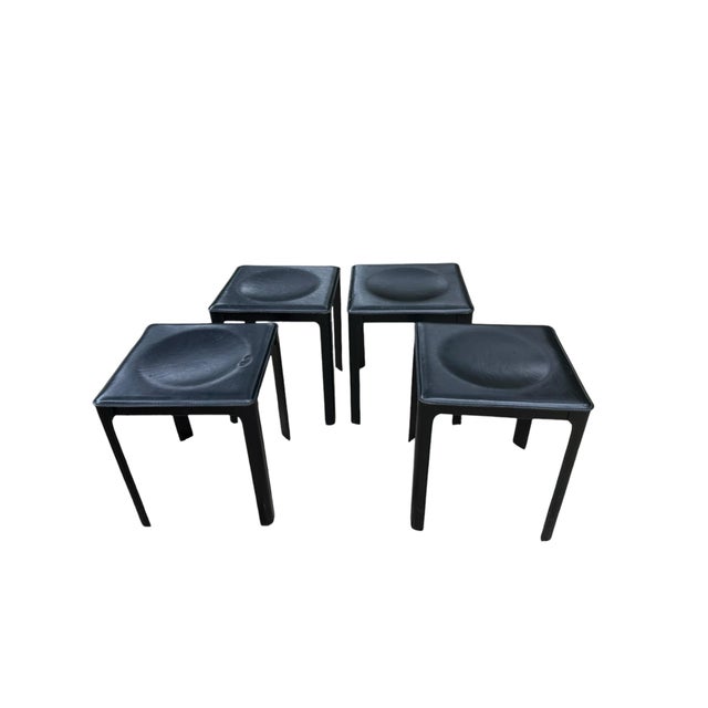 Set of Three Vintage Mateo Grassy Black Leather Stools Italy. All 3 seats are completely covered in black leather on a...