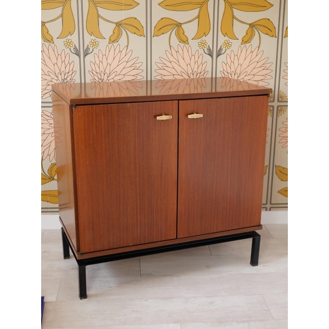 Vintage 1950s sideboard designed by Marcel Gascoin, from the Alvéole collection (interior label present). A piece that...