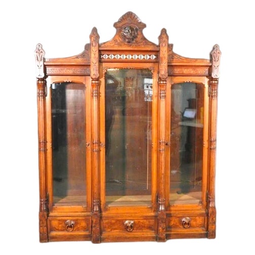 Attributed to Daniel Pabst Walnut Renaissance Revival Bookcase – Figural Victorian Three-Door Display Cabinet C. 1870 For Sale