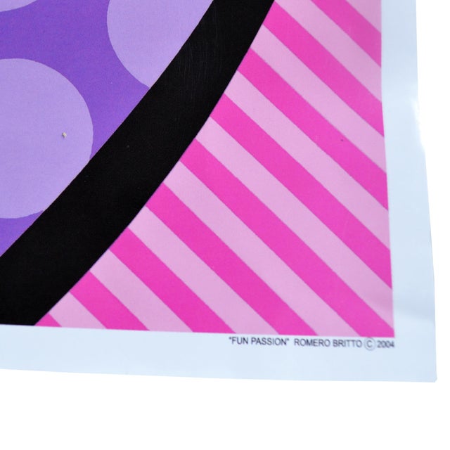 "Fun Passion" is a print depicting a jubilant dancing couple in Romero Britto's unmistakable pop art style. The...