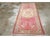 This early 20th century Turkish Oushak rug, showcases the region’s renowned artistry and distinctive use of color. The...