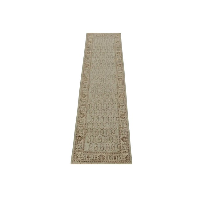 This contemporary 3x10 runner is a new addition to Rug & Kilim's Homage Collection. Hand-knotted in wool, it recaptures...