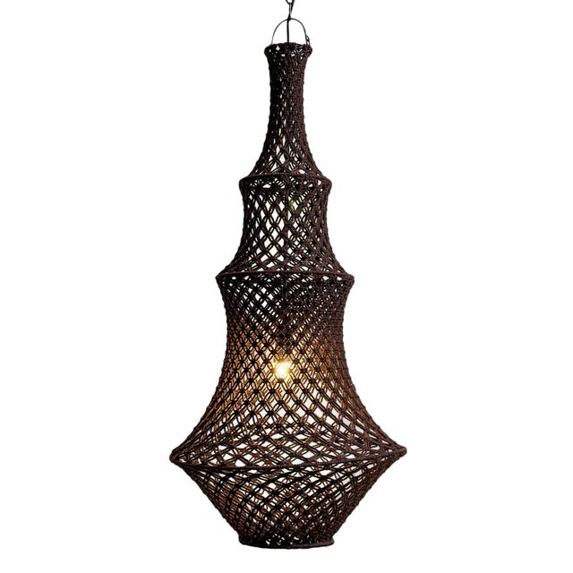 Hand woven rich chocolate brown elongated macrame pendant light. Overall height includes he 3" metal handle at top....