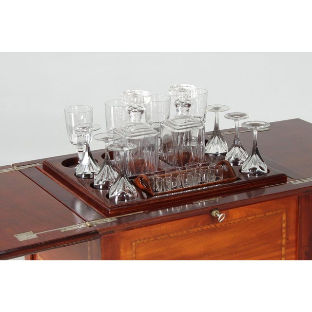 Antique serving table with hidden bar compartment england mahogany early 20th century dimensions: h x w x d: 79 x 60 x 55...
