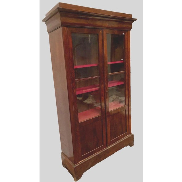 Louis Philippe style mahogany and mahogany veneer display cabinet Oak frame veneered with mahogany It opens with two...