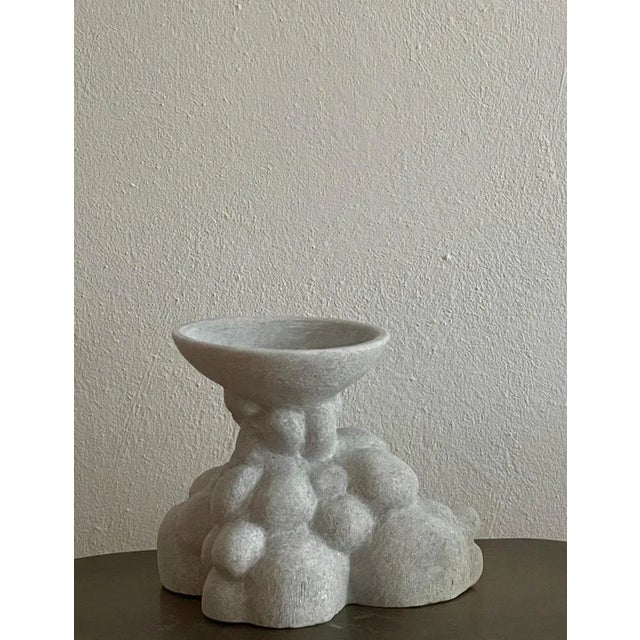 Hand carved marble vessel by tom von kaenel materials: marble dimensions: w14 x d24 x h20 cm tom von kaenel, sculptor and...