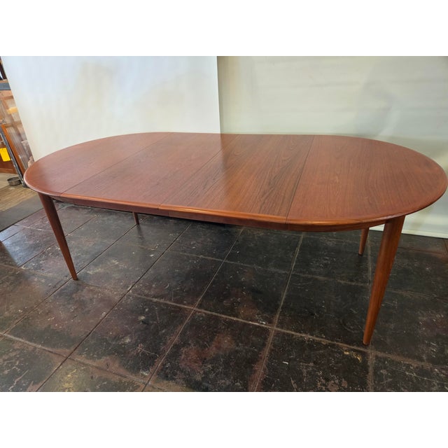 Wood Mid- Century Danish Modern Teak Dining Table Round Opens Oval 105 Inches With 3 Leaves For Sale - Image 7 of 18