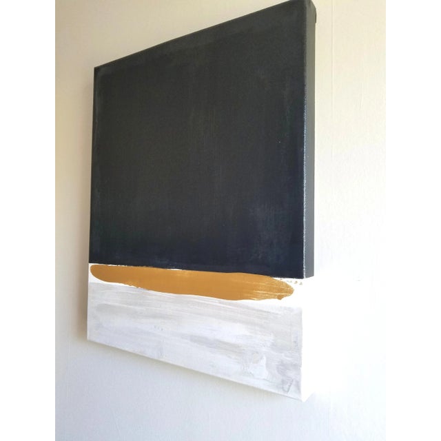 Painting: Mixed media acrylic paint on canvas. The primary colors are shades of black,white, gray and gold metallic paint....