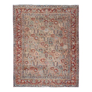 Antique Persian Bakhtiari Rug Featuring Repeating Floral Motifs and Rich Red For Sale