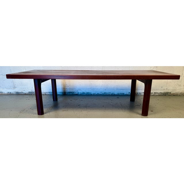 Strikingly elegant and timeless in form, this Mid-Century Danish Rosewood Coffee Table is a sophisticated example of...