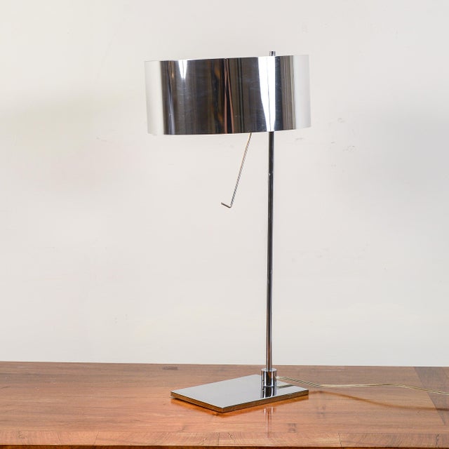 This modern table lamp is an excellent example of contemporary design, ideal for those seeking a minimalist and functional...