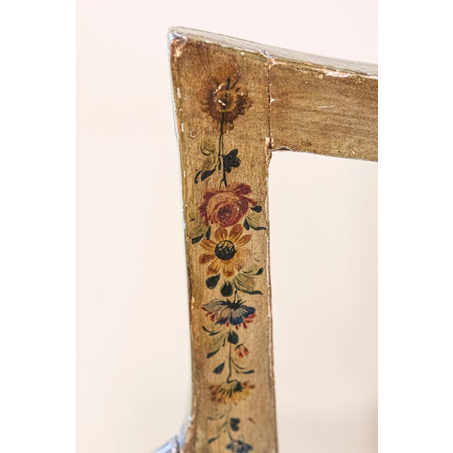 A Venetian 18th century painted and gilt wood sofa with new upholstery. This rare Italian sofa features a pierced back,...