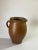 Jug or pitcher, with an exceptional patina. It's color with brown gives very pleasant contrasts. This Pitcher was created...