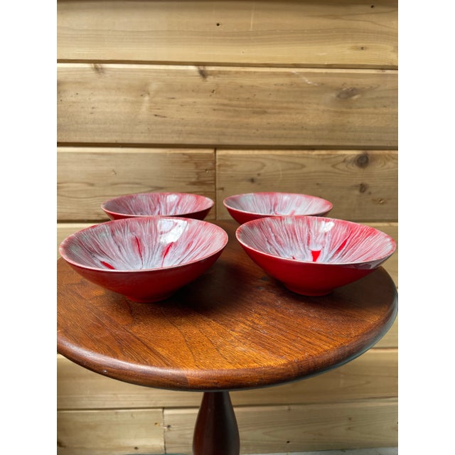 These beautiful hand-made bowls have a cheery bright red color under an alabaster drip glaze which pools in the bottom to...