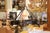 This antique French chandelier blends Gothic Revival character with a restrained, architectural silhouette. Crafted in...