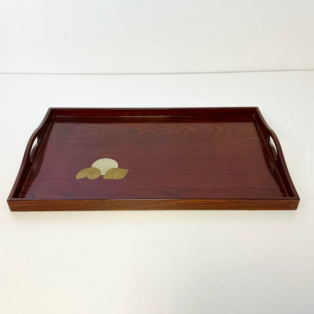 Vintage Home is pleased to offer this vintage faux Rosewood Tray. It’s a large tray measuring 19” x 12” with slotted side...