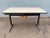 George Nelson action office table with aluminum feet, single drawer, and off-white melamine top, manufactured by Herman...