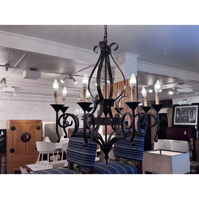 Design Plus Gallery presents a Wrought Iron Chandelier in the Style of Paul Ferrante by Arte de Mexico. The well crafted...