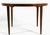 A Danish modern rosewood dining table. This table is a perfect size for a cozy dining space, be it adjacent to a kitchen,...