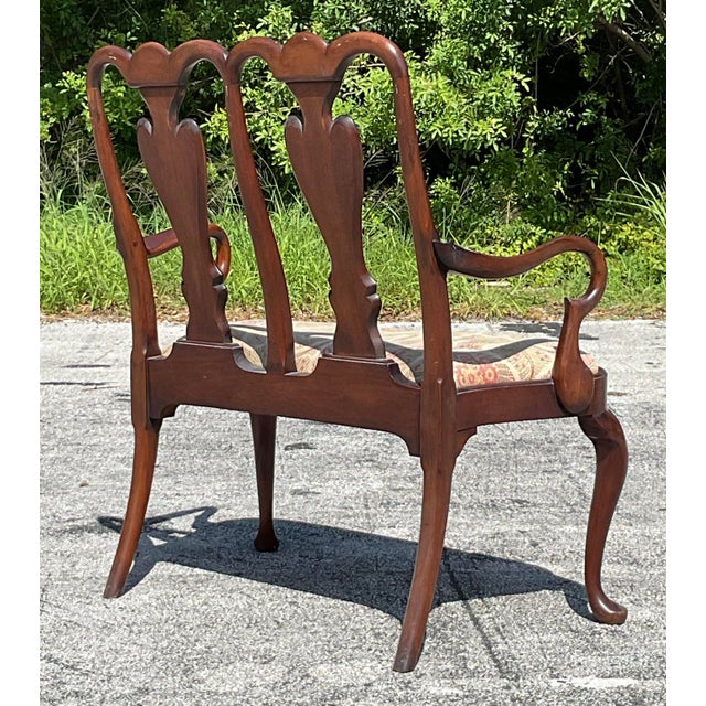 This exquisite piece features intricate inlay work and classic Chippendale design, exuding timeless elegance and...