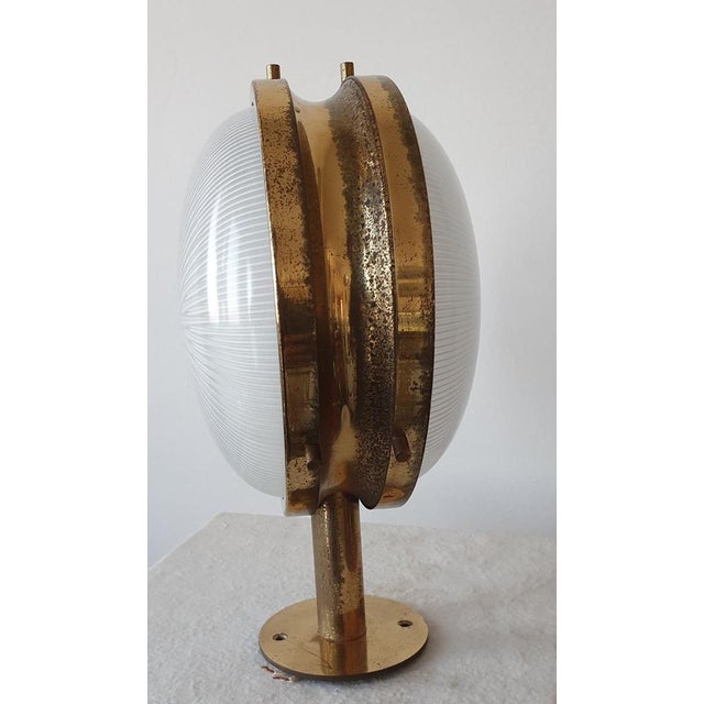 Designed by Sergio Mazza in 1960, the "Gamma" wall lamp represents one of the most elegant examples of Artemide's early...