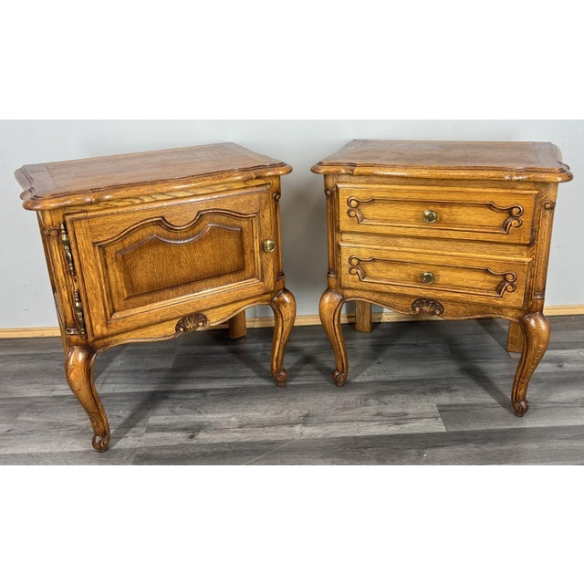 This beautiful pair of vintage French Louis-style bedside cabinets showcases the timeless charm of traditional...