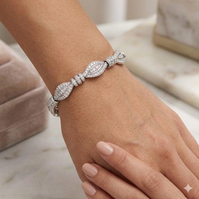 18k Bracelet with 434 pave set round brilliant diamonds weighing approximately 6.00 carats and 29.20 grams of 18k gold.