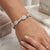 18k Bracelet with 434 pave set round brilliant diamonds weighing approximately 6.00 carats and 29.20 grams of 18k gold.