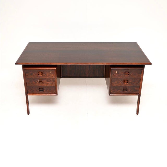 An exceptional Danish vintage desk by Arne Vodder. This was made by Brouer Mobelfabrik in Denmark, it dates from the...