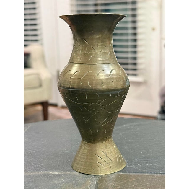 Beautiful vintage mid-century Chinese brass bud vase featuring an elegant, sculptural silhouette and hand-etched geometric...