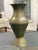Beautiful vintage mid-century Chinese brass bud vase featuring an elegant, sculptural silhouette and hand-etched geometric...