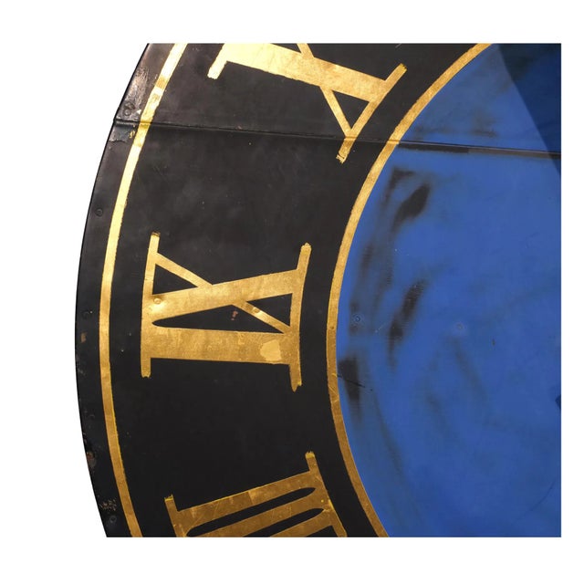 A huge early 20th century French hand-paint tower clock face with large gold Roman numerals on a black background with a a...