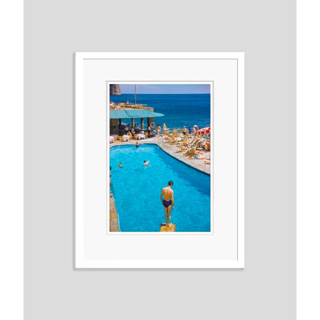 A Pool In Capri by Toni Frissell Bathers at a beachside swimming pool, Capri, Italy, 1959. (Photo by Toni Frissell) 20x16"...