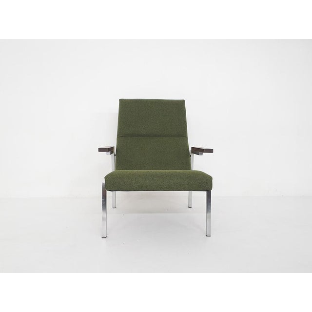 High back lounge chair by Martin Visser for 't Spectrum model SZ67 Metal frame and wenge arm rests. with new green...