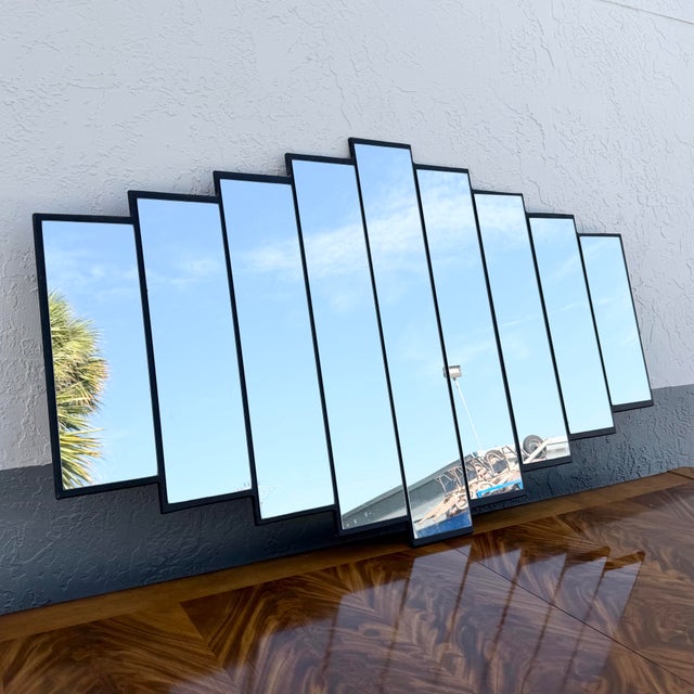 This striking vintage Art Deco wall mirror features a dramatic ascending stepped silhouette inspired by the iconic...