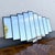 This striking vintage Art Deco wall mirror features a dramatic ascending stepped silhouette inspired by the iconic...