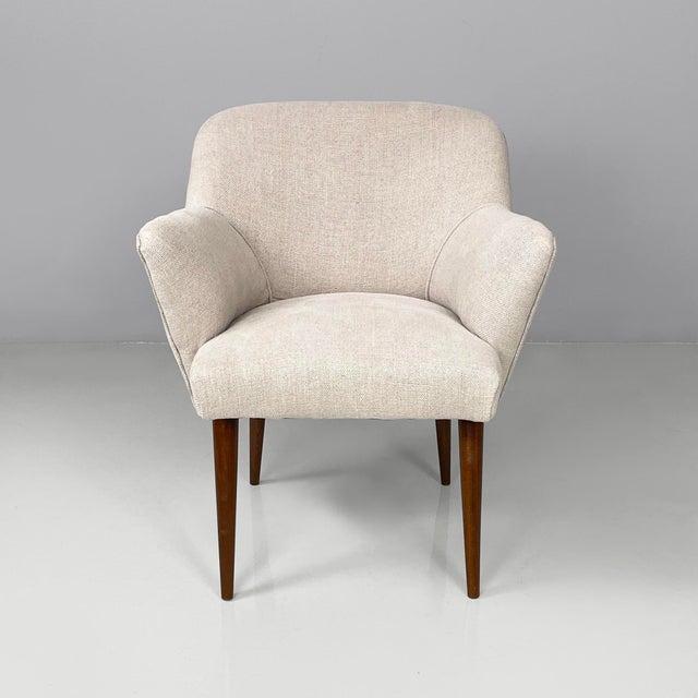 Italian mid-century modern armchairs in fabric and wood, 1940s Pair of armchairs with padded seat, back and armrests...
