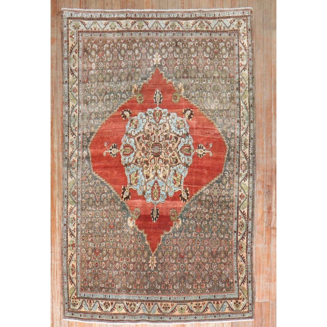 an early 20th-century Persian Bidjar Iron Fist accent rug Details rug no. j3283 size 4' 8" x 7' (142 x 213 cm)