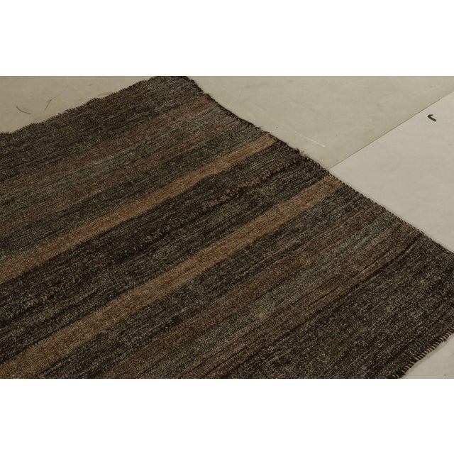 Connoting mid-century Persian wool panel-weaving style, a 6x6 vintage kilim from our newly unveiled flatweave curations....