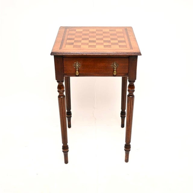A wonderful antique walnut chess table, made in England and dating from around the 1920’s. It is of superb quality and is...
