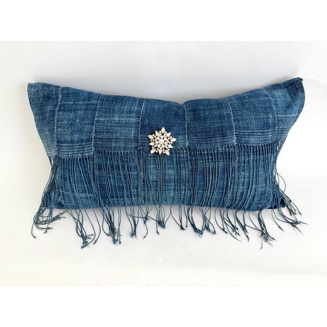 This custom envelope lumbar pillow created using a hand selected Mali cotton striped indigo textile with slightly nubby...