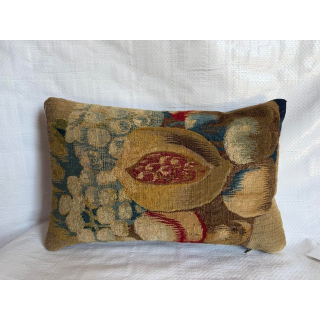 This exceptional antique pillow is fashioned from a 17th-century Brussels tapestry fragment, featuring a richly decorative...