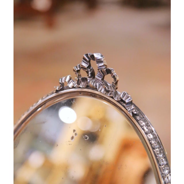 French Early 20th Century French Silverplated Over Nickel Vanity Mirror With Bow Crest For Sale - Image 3 of 6