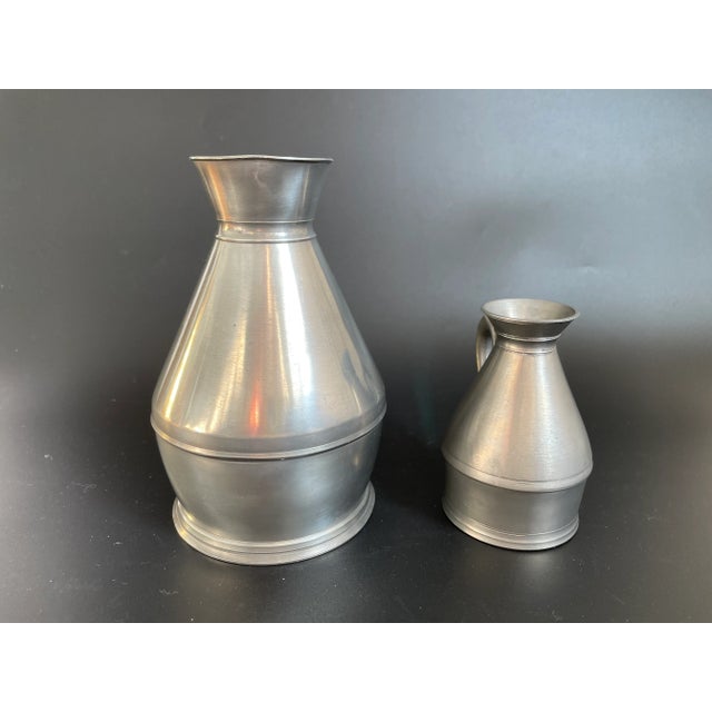 2 English & Irish Haystack Pewter Measures. Larger one (pint) is made by A.E. Williams and Thomas Williams; Smaller one...