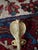 This is a pair of striking Vintaged gold brass cobra door handles with incised decoration in the Hollywood Regency and...