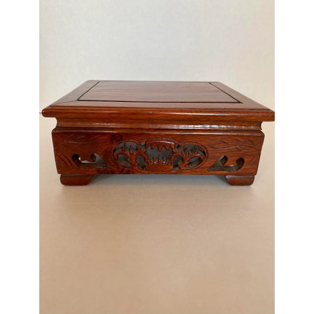 Mid 20th Century carved wood stand, platform, base. Rectangular shape with carvings around all four sides. Probably...