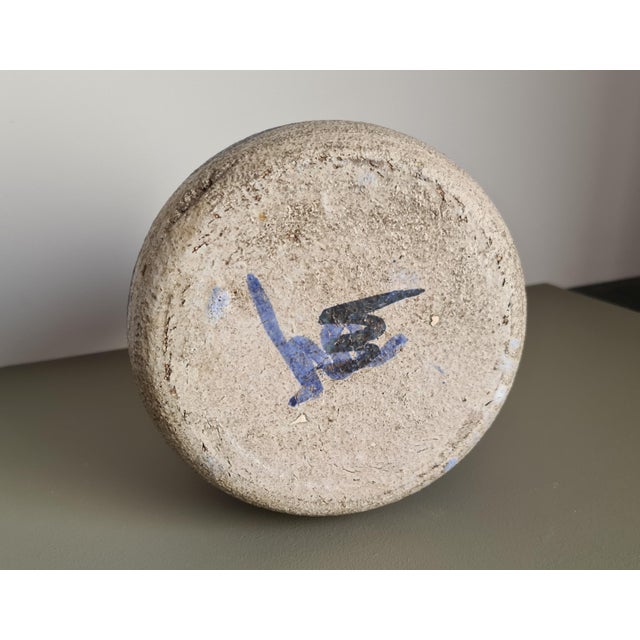 Vintage stoneware art ceramic dating from the 1960s-1970s, showcasing remarkable craftsmanship and contrasts. This...