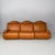 Italian modern modular brown leather sofa, 1970s Composed of three sections, upholstered in cognac color leather and...
