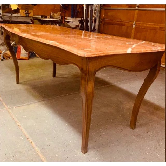 19th century Louis XV walnut console table with rojo alicante marble top with ogee edge , This table is grand and...
